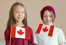 kids holding canada flag